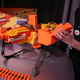 Illustration for article titled Hands On Enough Nerf Weaponry to Storm the Pentagon: Vulcan Mini-Gun, Hulk Rocket Launcher and Iron Man Repulsor